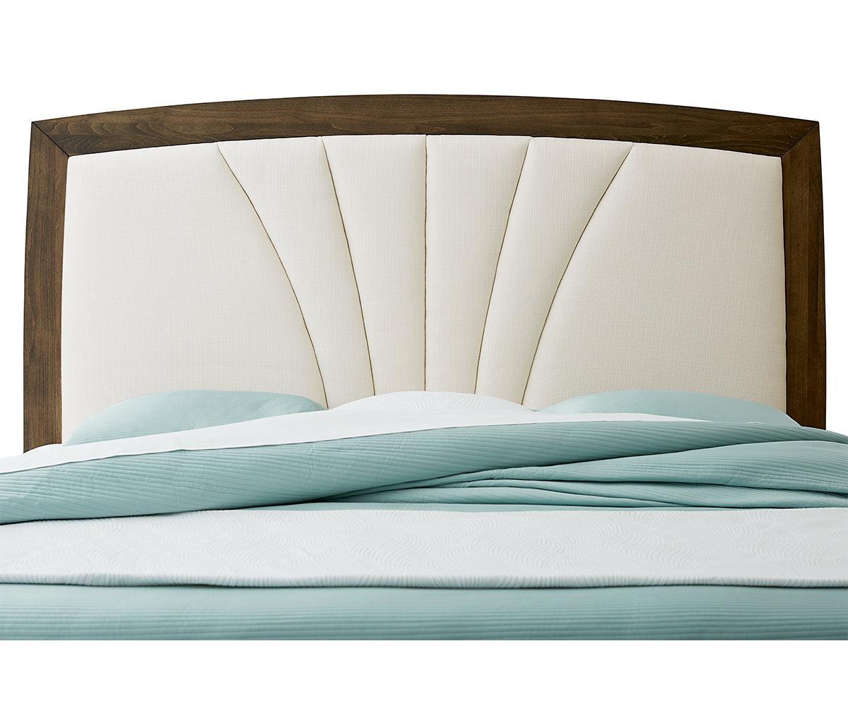 american made amish woodmont bed shown with a fabric headboard