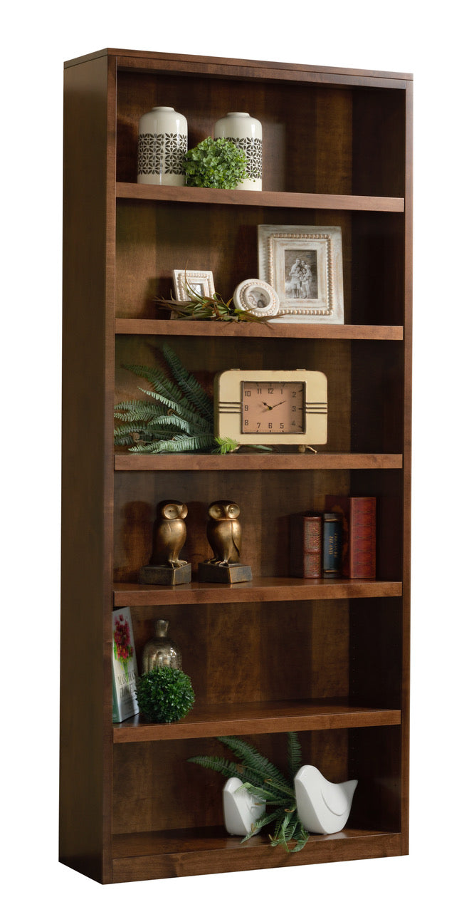 contemporary bookcase 12" deep, 36" wide, and 72" high. shown in brown maple wood with earthtone stain. 