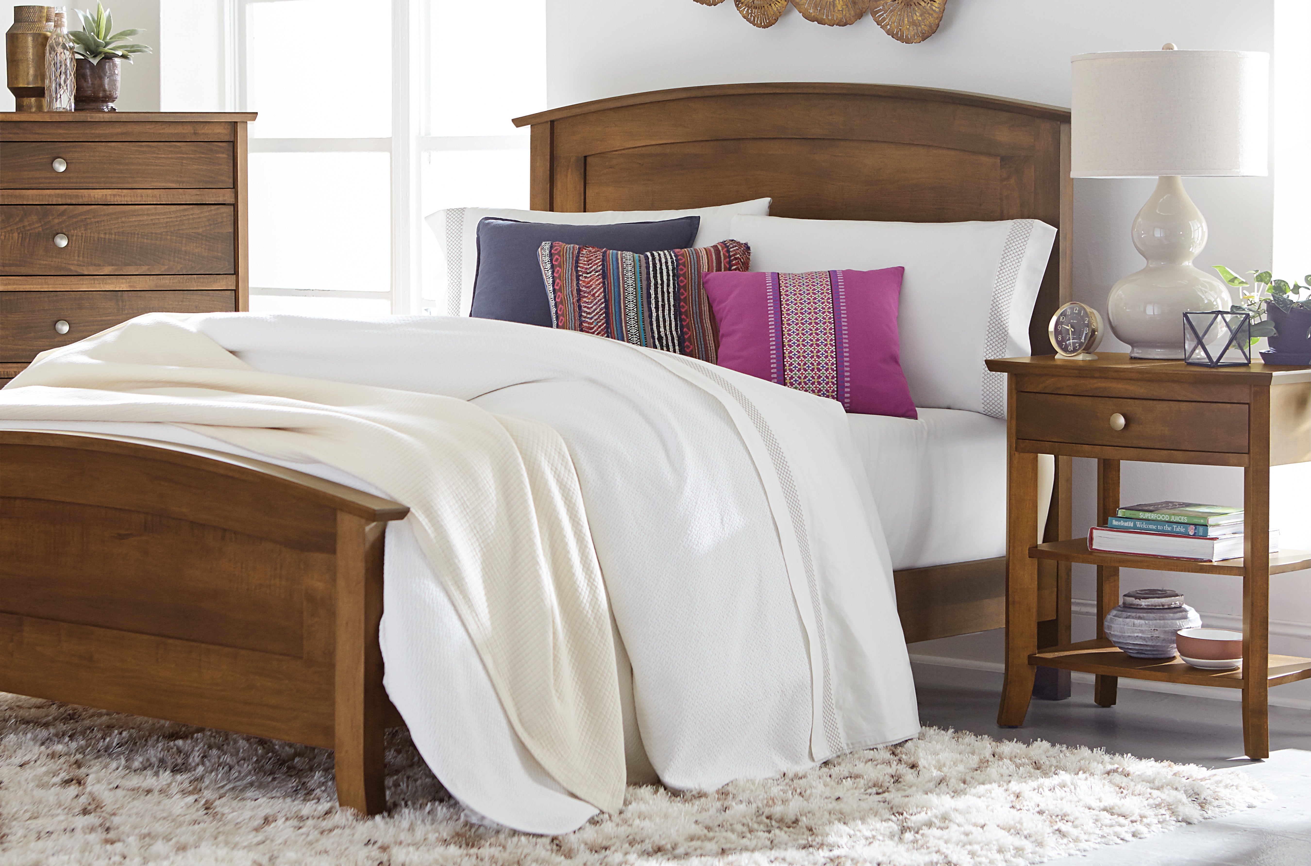 the amish laurel bed set shown in brown maple with a chocolate spice stain