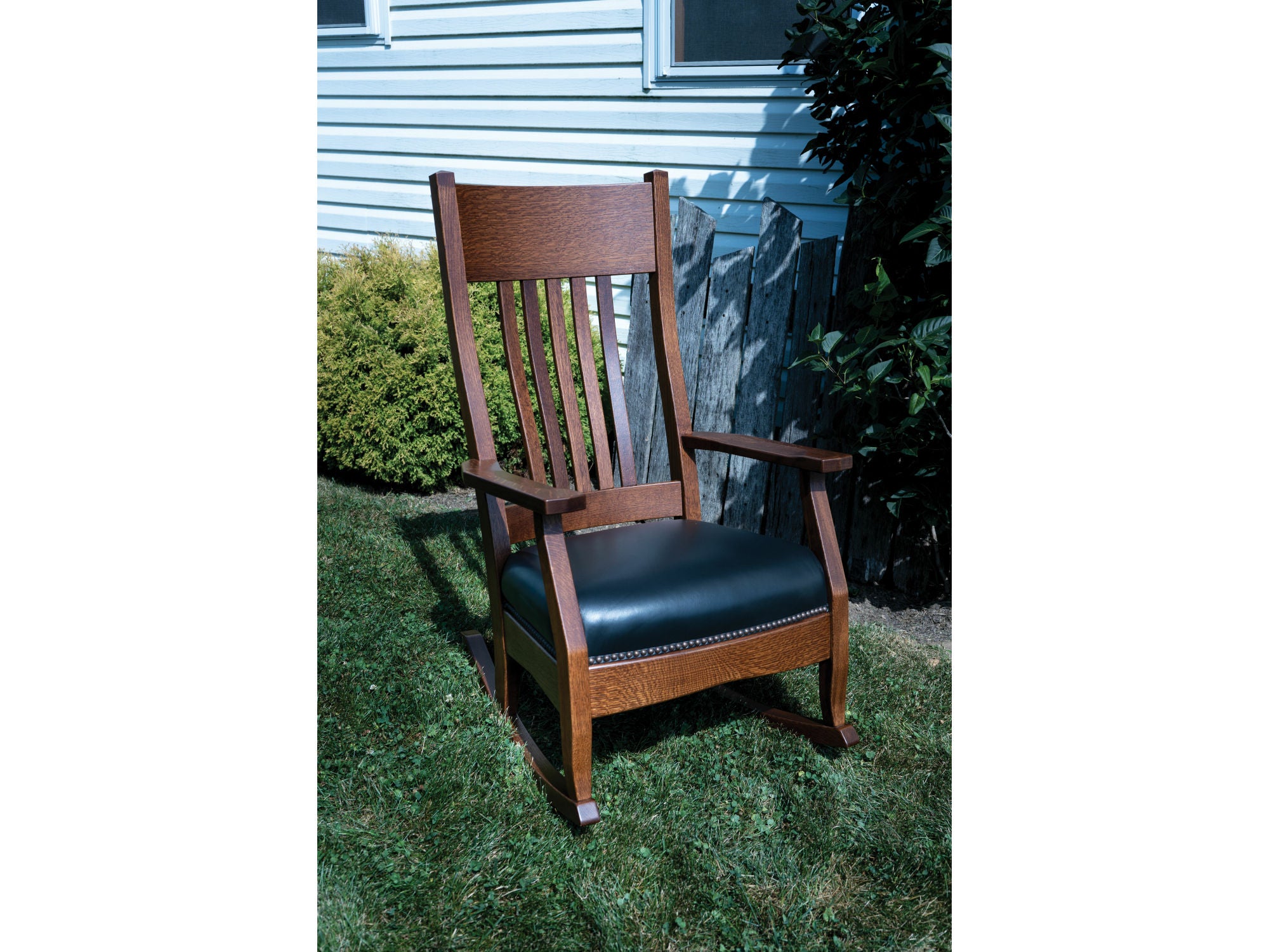 Amish Mission 43" Rocker quarter sawn white oak with michaels cherry stain and black leather seat